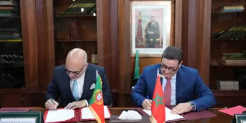 Moroccan Minister of Transport and Logistics Abdessamad Kayouh and Portuguese Minister of Infrastructure and Housing Miguel Pinto Luz.