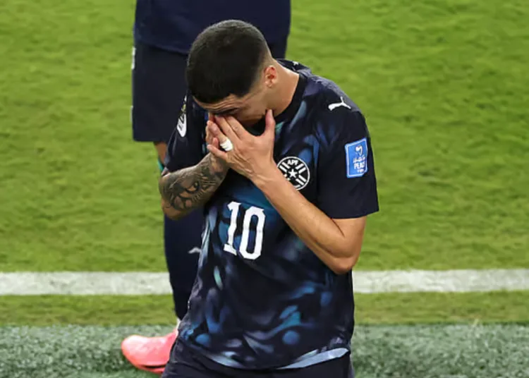 Paraguay forward Miguel Almiron became the first player sent off under a new rule against covering the mouth during confrontations