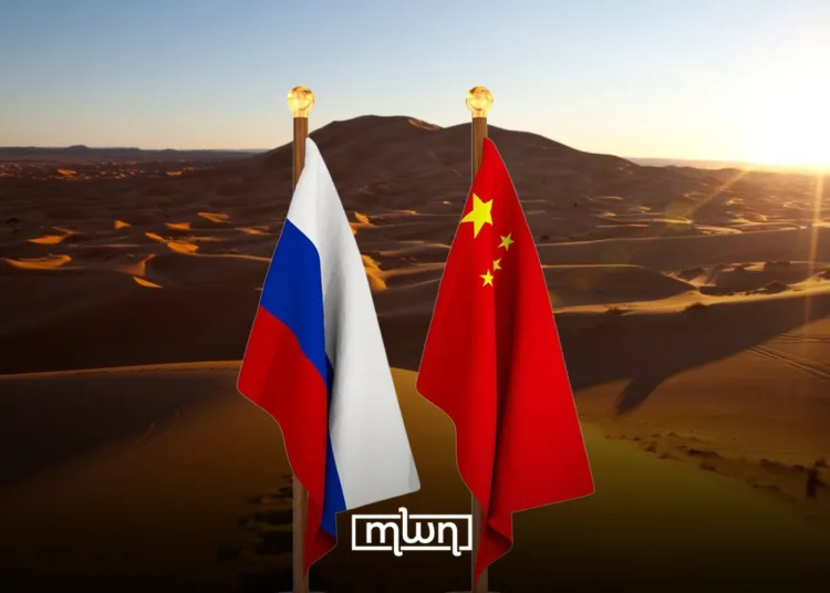 Western Sahara with the flags of China and Russia.