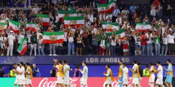 The United States will continue to evaluate Iran’s travel arrangements during the 2026 FIFA World Cup, though officials say the current system remains in place despite growing tensions and a planned complaint to FIFA.