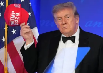 US President Donald Trump used a rescheduled White House Correspondents’ Dinner on Friday to revive talk of a third term, which the Constitution bars, before going further and pulling out a red “Trump 2028” cap.