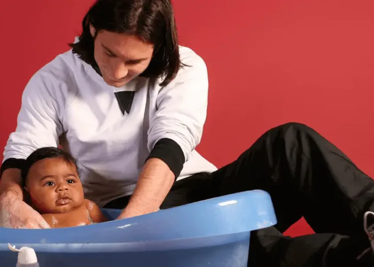 In December 2007, Lionel Messi took part in a Barcelona charity photoshoot with a baby he had never met.
