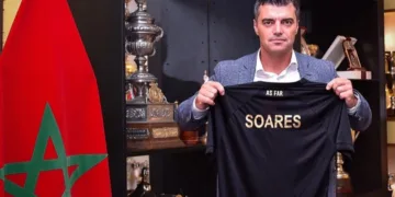AS FAR new coach