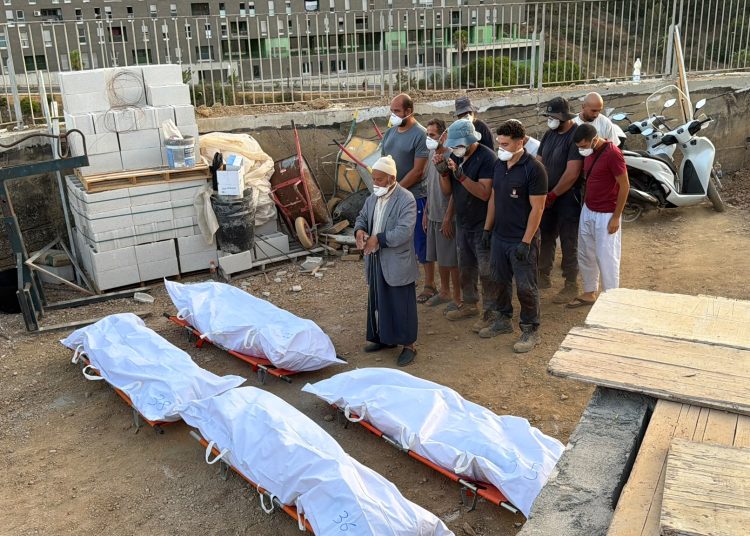 The latest 12 victims were laid to rest on Sunday afternoon, in the third round of burials since Friday.