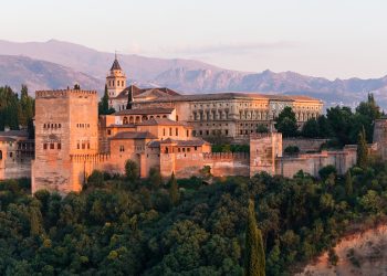 The Alhambra is a Nasrid-era palace and fortress complex in Granada, Spain, historically the country’s most visited monument and a UNESCO World Heritage Site.