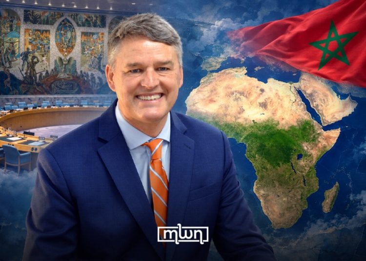 Hervé Verhoosel pictured against a backdrop featuring the UN Security Council chamber, a map of Africa and the Middle East, and the Moroccan flag. (Designed by MWN team)
