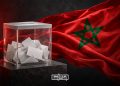 Ballot box set against the Moroccan flag, symbolizing the country’s legislative elections. (Designed by MWN team)