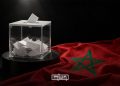 Ballot box beside the Moroccan flag, illustrating Morocco’s 2026 legislative elections. (Designed by MWN team)