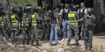 Moroccan police block recent migrant rush toward the Spanish-occupied Ceuta.