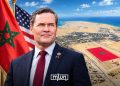 US Ambassador to the United Nations Mike Waltz pictured alongside the Moroccan and US flags, with an aerial view of Western Sahara in the background. (Designed by MWN team)