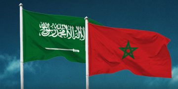 A graphic showing the Saudi Arabian and Moroccan flags flying side by side against a dark blue sky, by MWN Design Team.