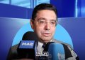 A graphic featuring Moroccan Foreign Minister Nasser Bourita speaking to the media, by MWN Design Team.