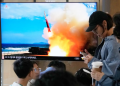 A TV screen shows a file image of a North Korean missile launch during a news program at Seoul railway station in South Korea on Saturday. Photograph: Ahn Young-joon/AP