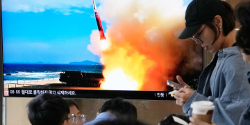 A TV screen shows a file image of a North Korean missile launch during a news program at Seoul railway station in South Korea on Saturday. Photograph: Ahn Young-joon/AP