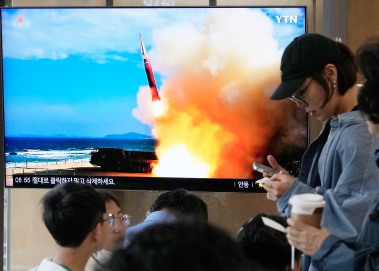 A TV screen shows a file image of a North Korean missile launch during a news program at Seoul railway station in South Korea on Saturday. Photograph: Ahn Young-joon/AP