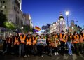 Protesters march from Puerta del Sol square, where they have been camped out for days, to the building where the late Maricarmen Abascal, an 87-year-old woman whose eviction sparked housing protests in Spain, used to live, in Madrid on Thursday. | REUTERS