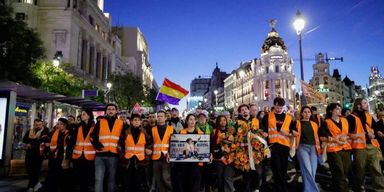Protesters march from Puerta del Sol square, where they have been camped out for days, to the building where the late Maricarmen Abascal, an 87-year-old woman whose eviction sparked housing protests in Spain, used to live, in Madrid on Thursday. | REUTERS