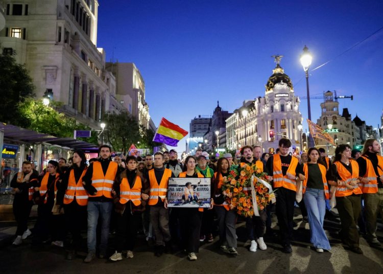Protesters march from Puerta del Sol square, where they have been camped out for days, to the building where the late Maricarmen Abascal, an 87-year-old woman whose eviction sparked housing protests in Spain, used to live, in Madrid on Thursday. | REUTERS