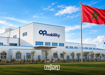 Illustration of an OPmobility manufacturing facility, featuring the company’s logo and the Moroccan national flag. (Designed by MWN team)