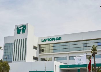 Exterior view of Moroccan pharmaceutical company Laprophan’s headquarters, featuring its green logo and signage on the building’s facade.