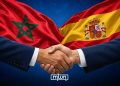 An illustration depicting a handshake against the Moroccan and Spanish flags, symbolizing bilateral relations and cooperation between the two countries. (Designed by MWN team)