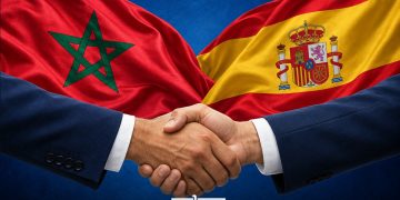 An illustration depicting a handshake against the Moroccan and Spanish flags, symbolizing bilateral relations and cooperation between the two countries. (Designed by MWN team)
