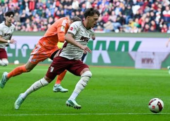 Augsburg forward Robin Fellhauer scored the fastest goal in Bundesliga history on Saturday after capitalizing on a costly mistake by Bayern Munich goalkeeper Manuel Neuer just eight seconds into their league encounter.