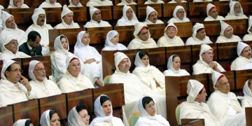 Moroccan parliamentarians attend a speech by King Mohammed VI marking the opening of Parliament’s autumn session in Rabat on October 10, 2003. The King announced a new Family Code granting expanded rights to Moroccan women and reforming marriage laws. Credit: AFP