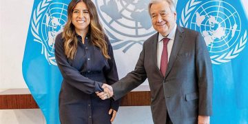 UAE Minister of State and former Permanent Representative to the UN Lana Nusseibeh shakes hands with UN Secretary-General António Guterres during a meeting at UN headquarters in New York in April 2024.
