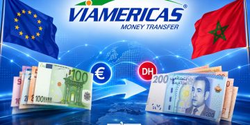 Viamericas’ logo pictured between the European Union and Moroccan flags, with euro and Moroccan dirham banknotes symbolizing cross-border money transfers to Morocco. (Designed by MWN team)
