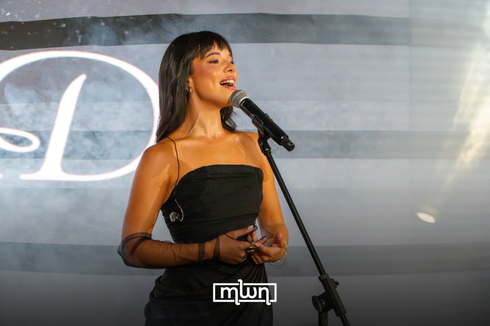 Moroccan singer OUIDAD performing at L’Oréal Paris’ Le Défilé watch party in Casablanca.